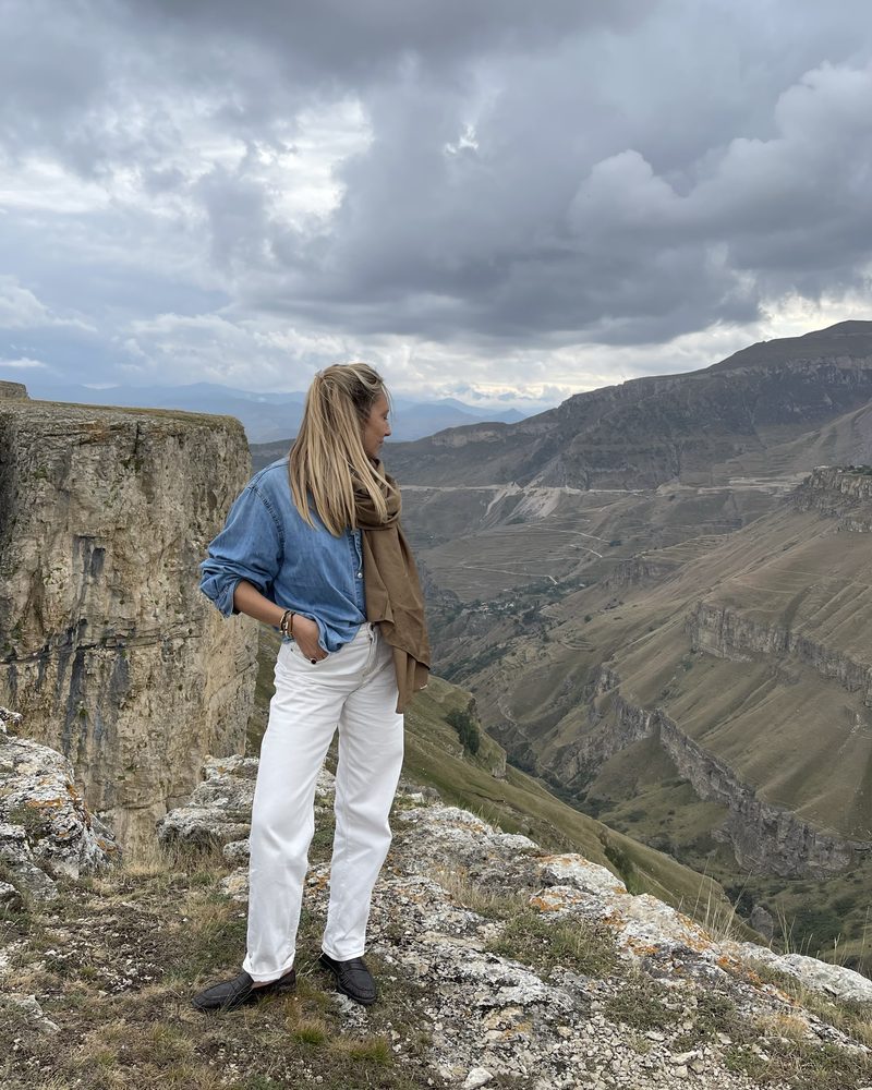 Denim shirt and white jeans in the Dagestan mountains